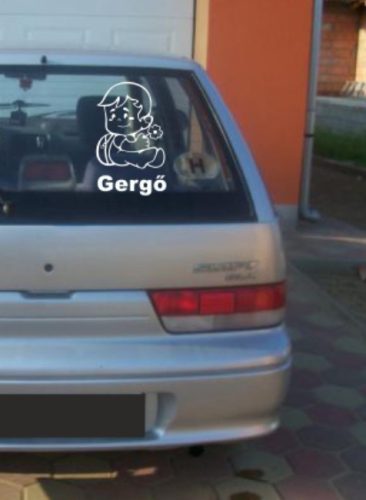 Autómatrica, Baba a kocsiban, Kisfiú virággal